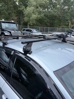 OMAC Roof Rack Cross Bars with Thule Kayak Carrier