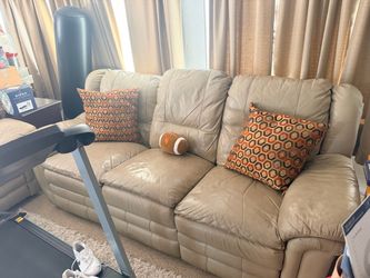 Reclining sofa must go