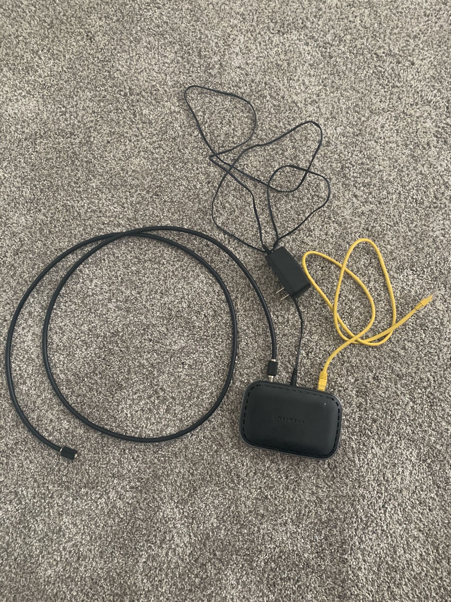 Netgear CM400 Modem with charger and cabling