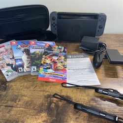 Nintendo Switch with Grey Joy-Con + Mario Kart 8 Deluxe + More Games