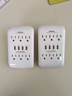 Two pre-owned wall Charging stations. Protected. Indoor use. Spares for every room and desk