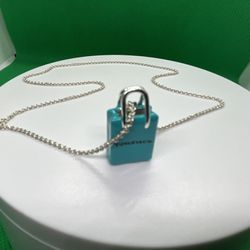 Ultra Rare Tiffany & Co Gift Bag Pendant necklace In Sterling Silver and blue Enamel
