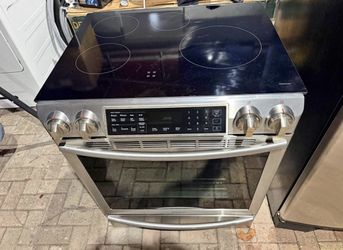 Samsung Stove Slide In Range. Likes New ! . Price Including Delivery
