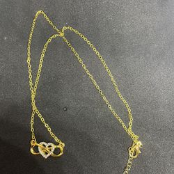 Gold And Diamond Accept Heart Trinity Knot Necklace 