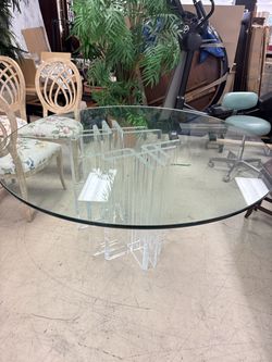 Vintage  Hollywood Regency style 60” dining table featuring a sculptural, clear acrylic
