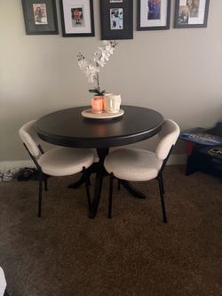 Table and two chairs for sale