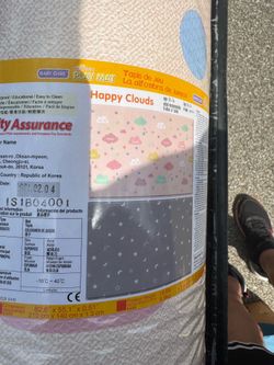 NEW SEALED Baby Care Reversible Playmat in the "Happy Clouds" design, crafted from polyvinyl resin