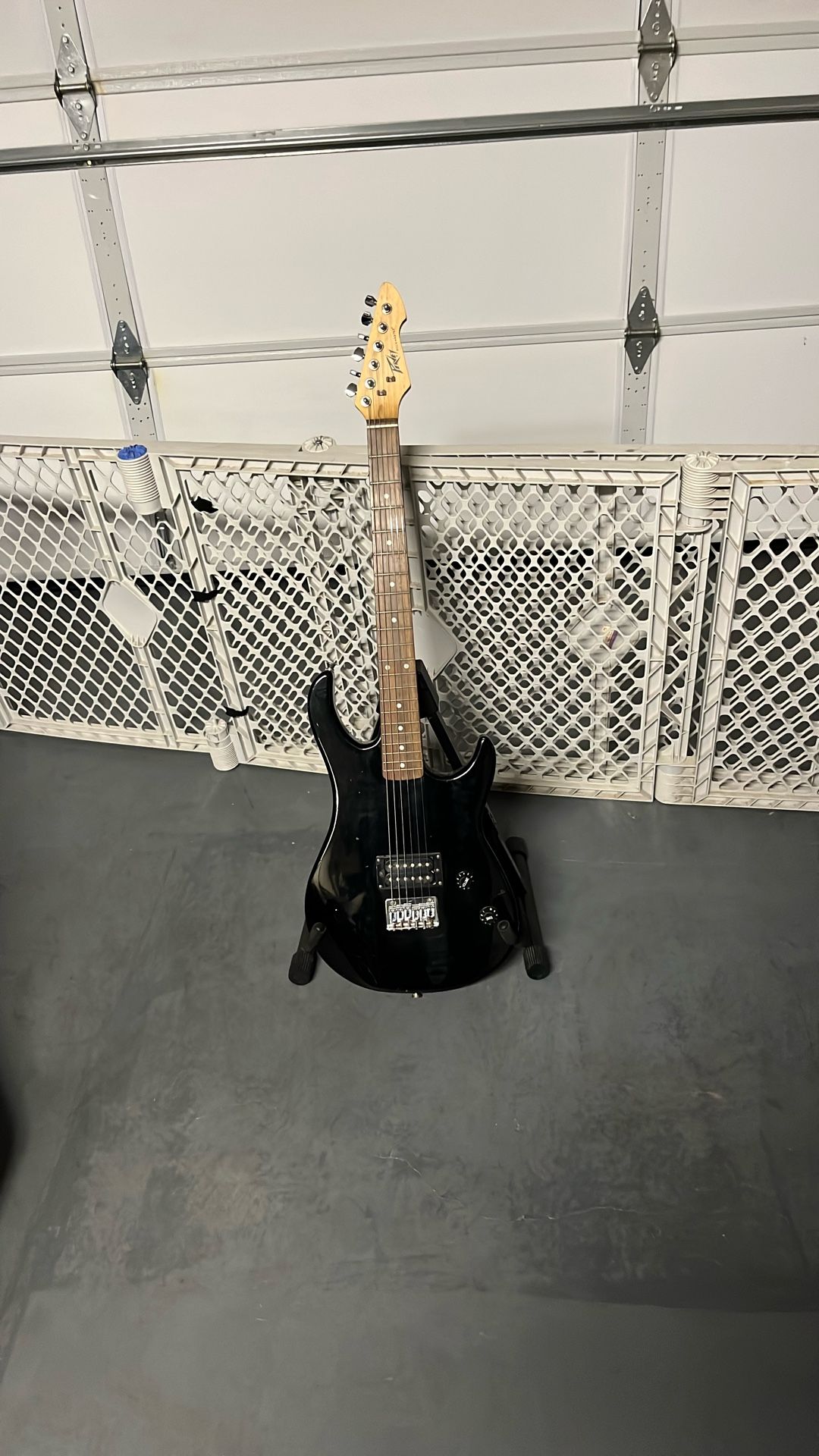 PV rock master six string electric guitar chrome hardware has one hum bucker pick up at the bridge tone and volume knob, not scratchy stays i stays in