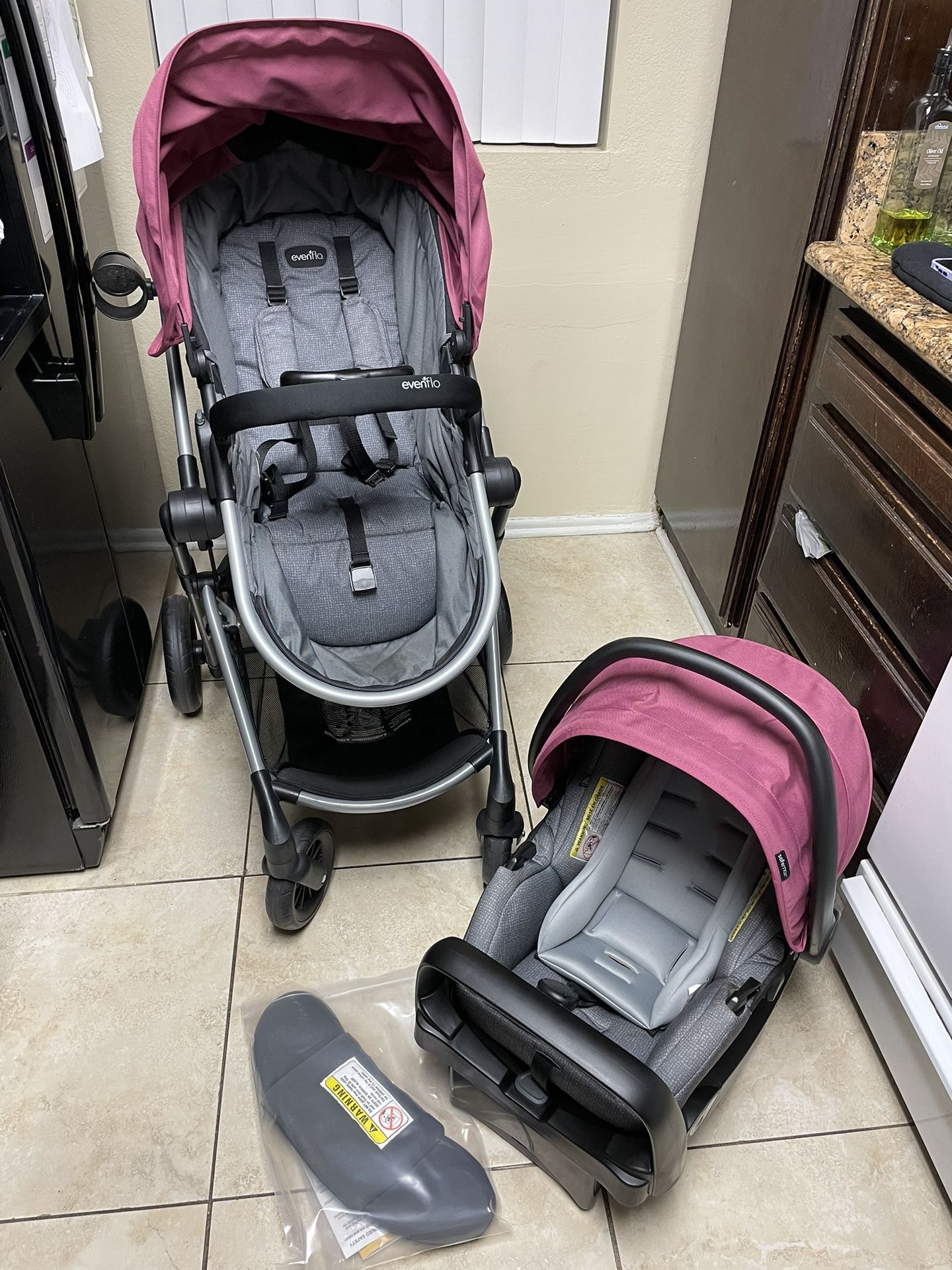 Evenflo Pivot Modular Travel System With SafeMax Car Seat for Sale