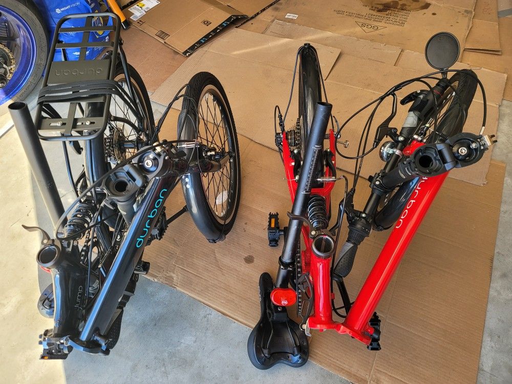 Pair of Near New Folding Bikes with Bags & Extras