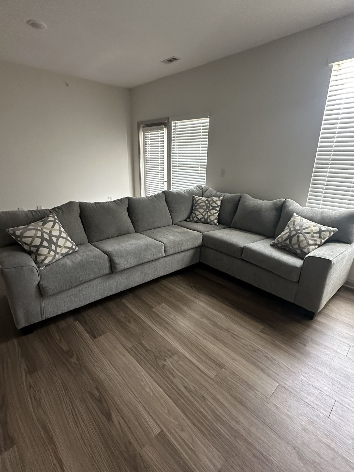 Modern Light Gray Sectional Sofa – L-Shaped with Accent Pillows