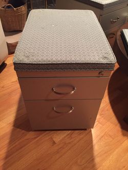 Rolling file cabinet with cushion top. 16”W x 22” x 22”