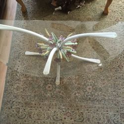 Glass top table with floral design