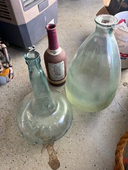 Vintage jars and wine bottle