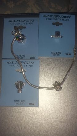 Sterling silver charm slide bracelet