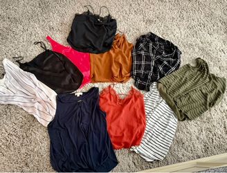 Women’s tops.  S-l sizes.  Same fit. $3 for all