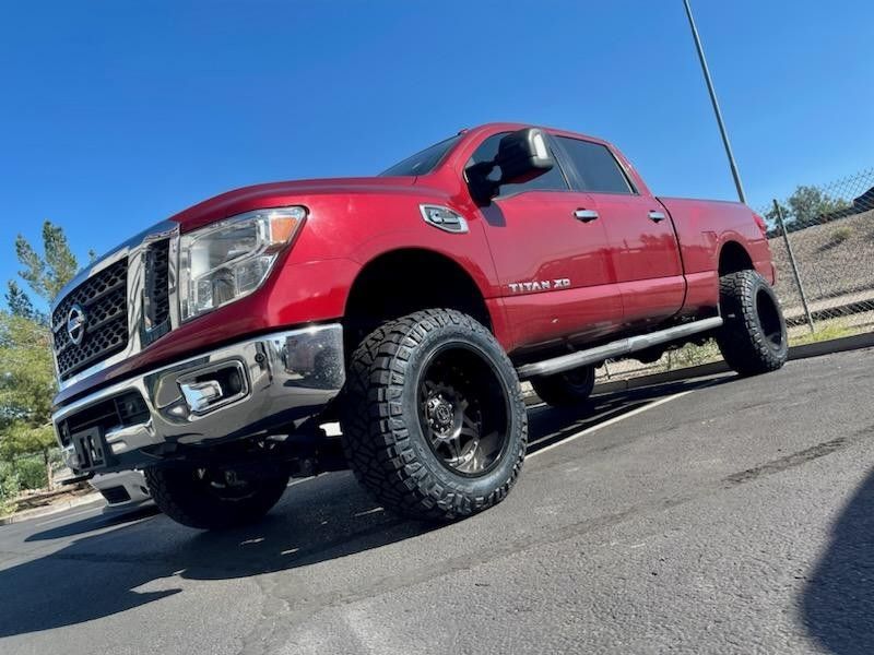 Nissan-Titan Lifts Rims Tires Accessories Side Steps Mufflers Alignments Installations.