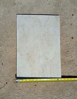 $1 Porcelain Tile, approx 300 sq ft, see ad.