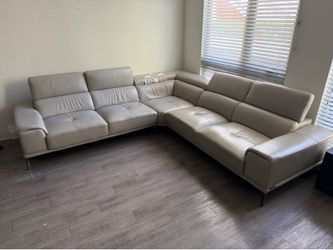 GENUINE LEATHER SECTIONAL SOFA 3 PIECE BY ABBYSON BRAND ..$1399 OBO