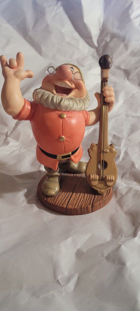 Cheerful Leader Of The  Snow White & The Seven Dwarfs Figurine