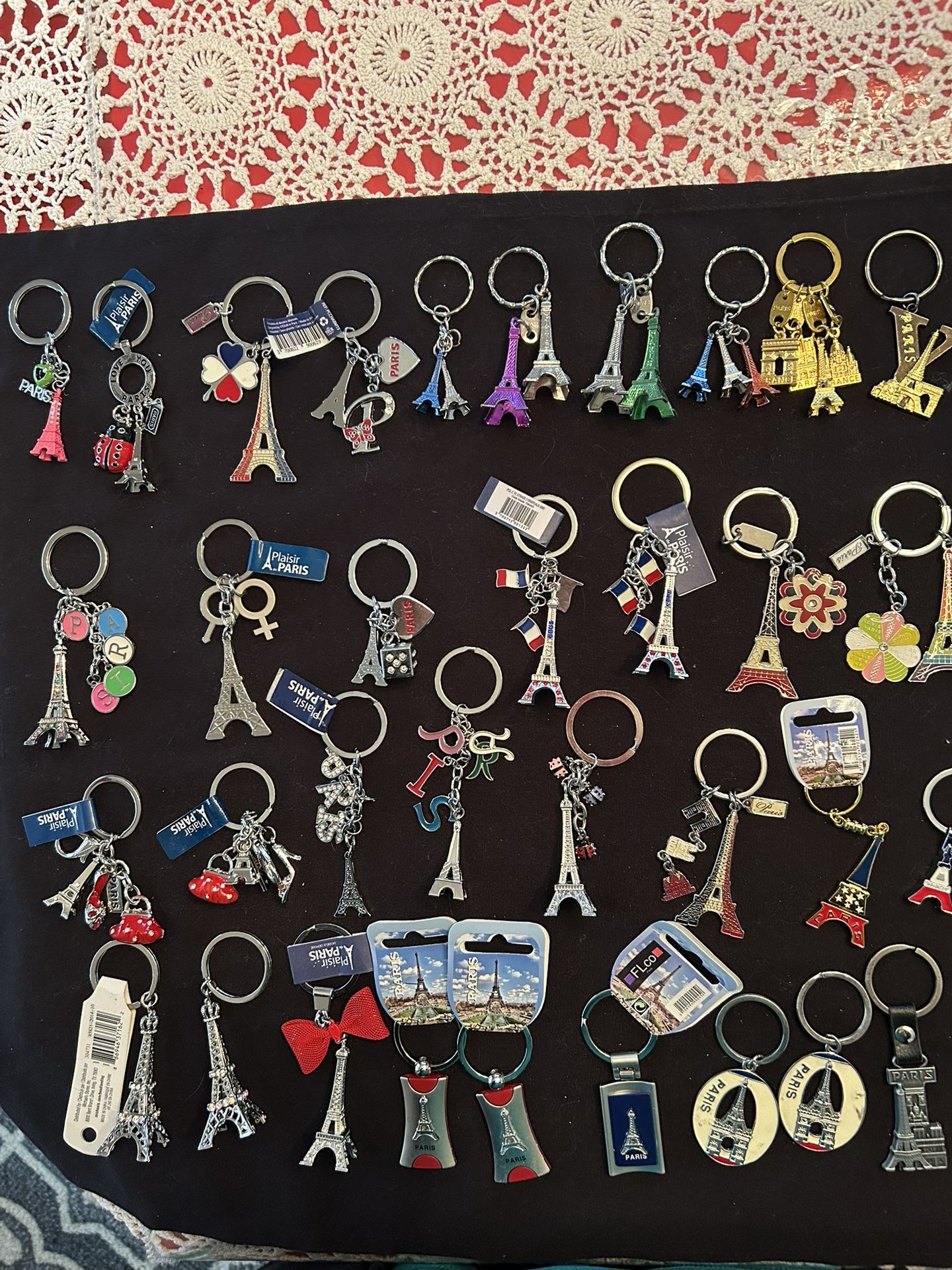 Set of colorful Eiffel Tower keychains.