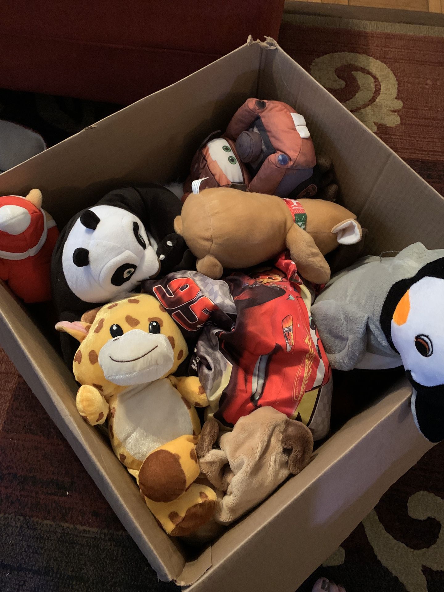 Box of miscellaneous stuffed animals