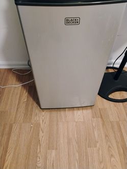 Small fridge holds  75 beers