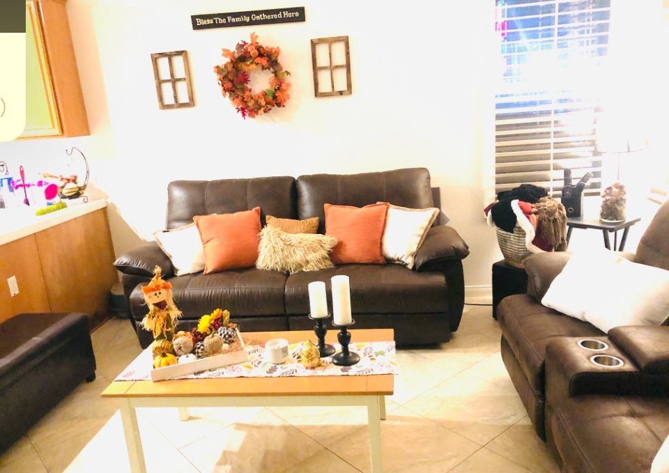 Brown reclining leather  couch and loveseat 