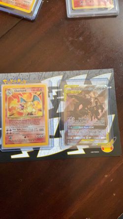 Charizard base set and tag team Umbreon and Darkrai