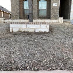 STONE WORK/FLOWER BEDS