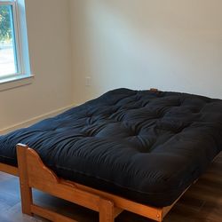 Queen Size, Futon Bed/couch. Wooden Base/frame. Cushion Is 1 Foot Thick