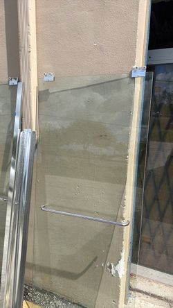 Used  standard. Shower Doors.