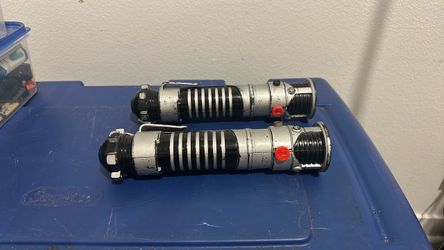 Hasbro retractable light sabers blue and purple