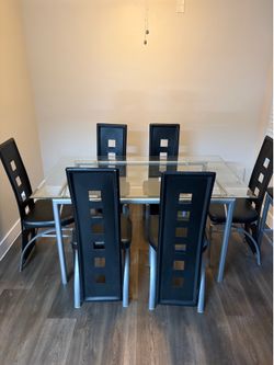Glass table 6 chairs plus 2 high bar matching chairs