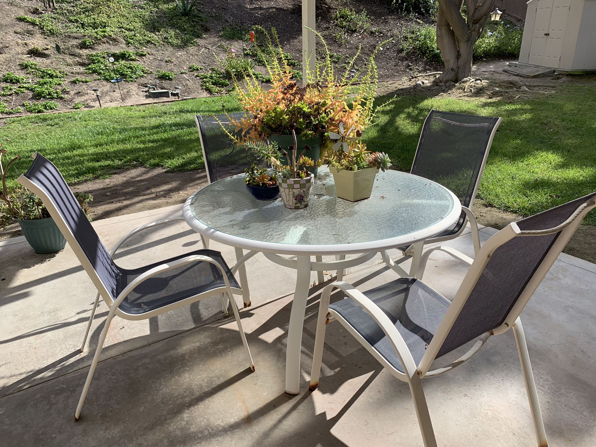Free patio table with four chairs