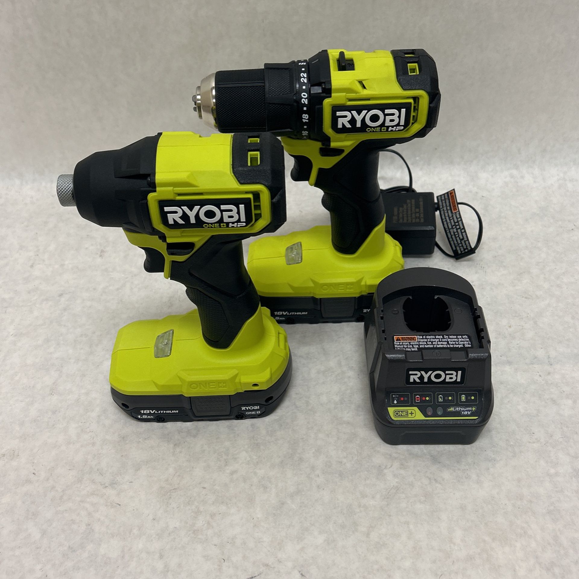 Ryobi 1+ drill and impact set two batteries charger new