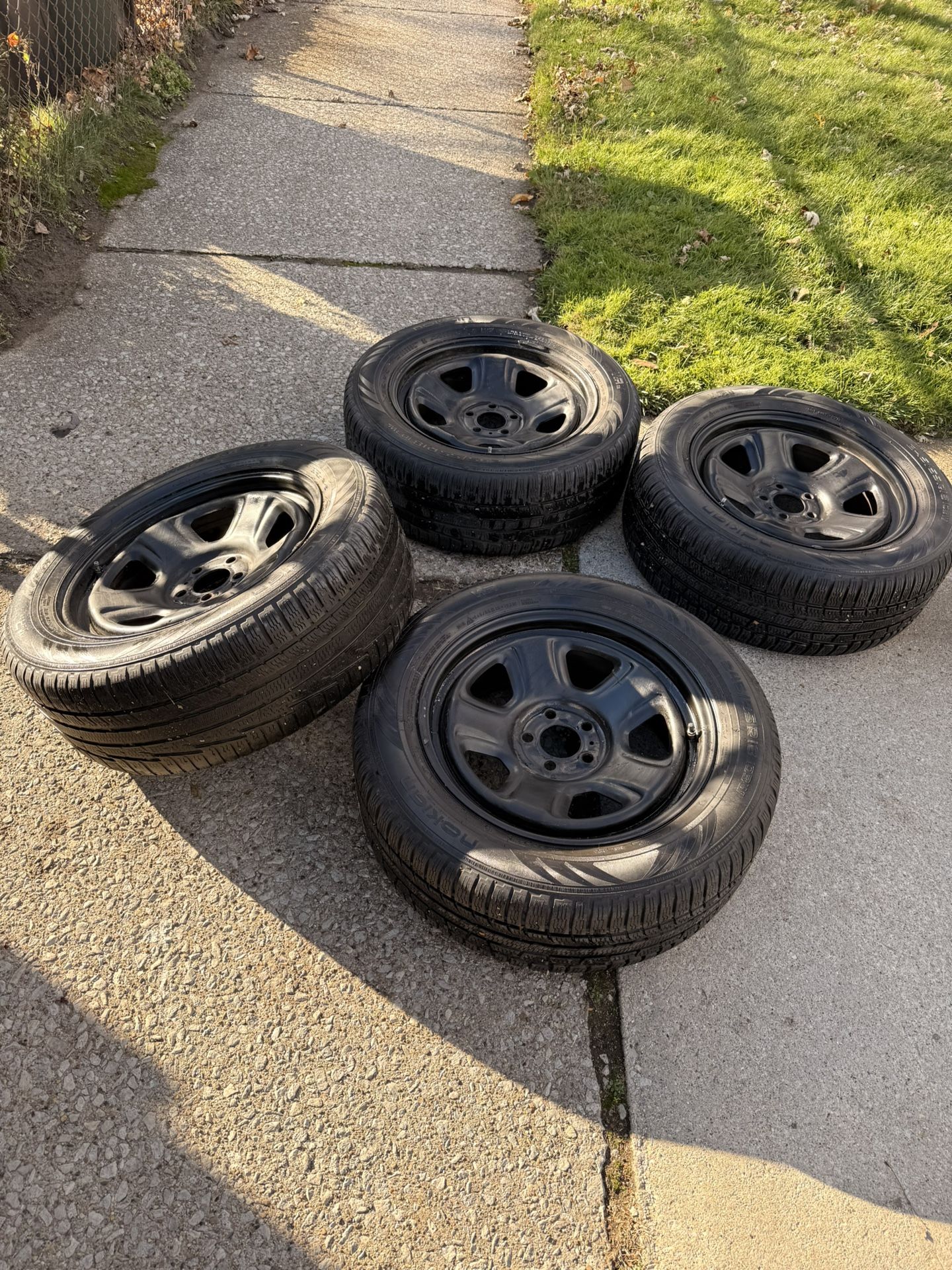 245 55 R18 Tires With Black Steelies