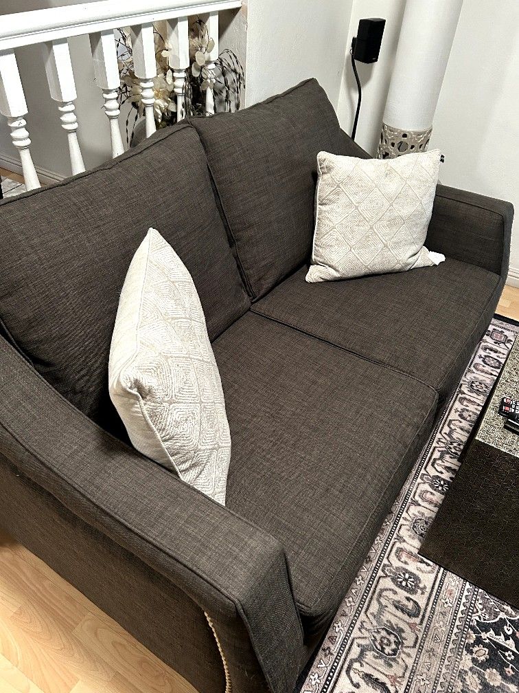 Gray sofa and love seat
