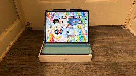 Apple iPad Air 13in. with Case Blue IF YOU SEE IT IT STILL AVAILABLE