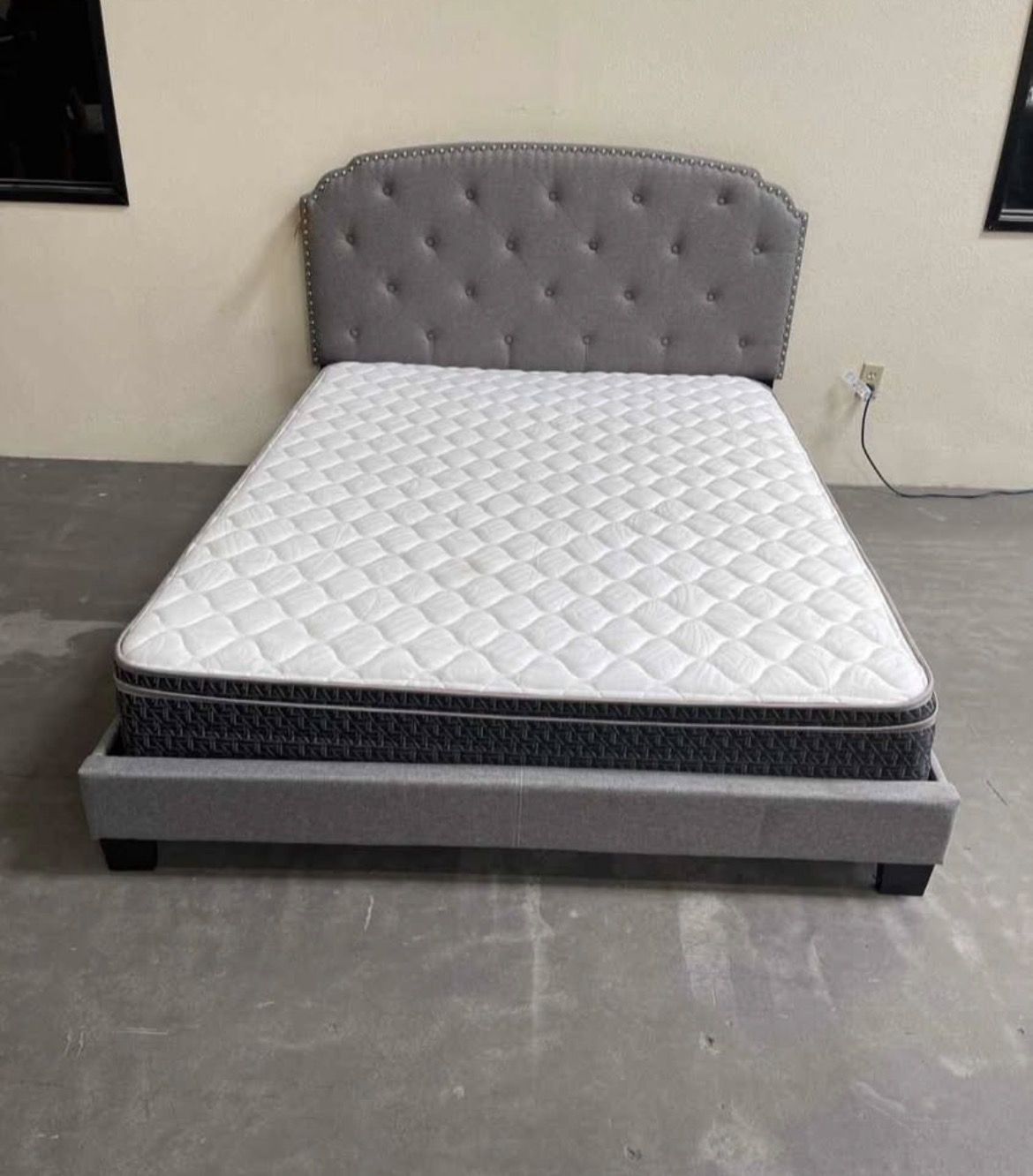 Brand new queen size grey linen upholstered platform bed frame with mattress.