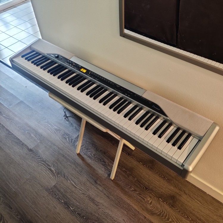Casio 88-key Digital Piano Keyboard - Semi Weighted Hammer Action - Tri-element ZPI Sound - 202 tones, 120 rhythms, 32-note polyphony (MSRP $800)