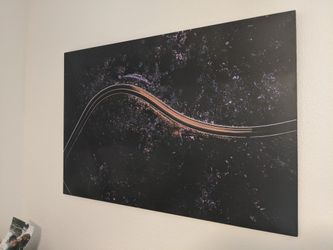 24x36 inch Drone photo of car going through a canyon