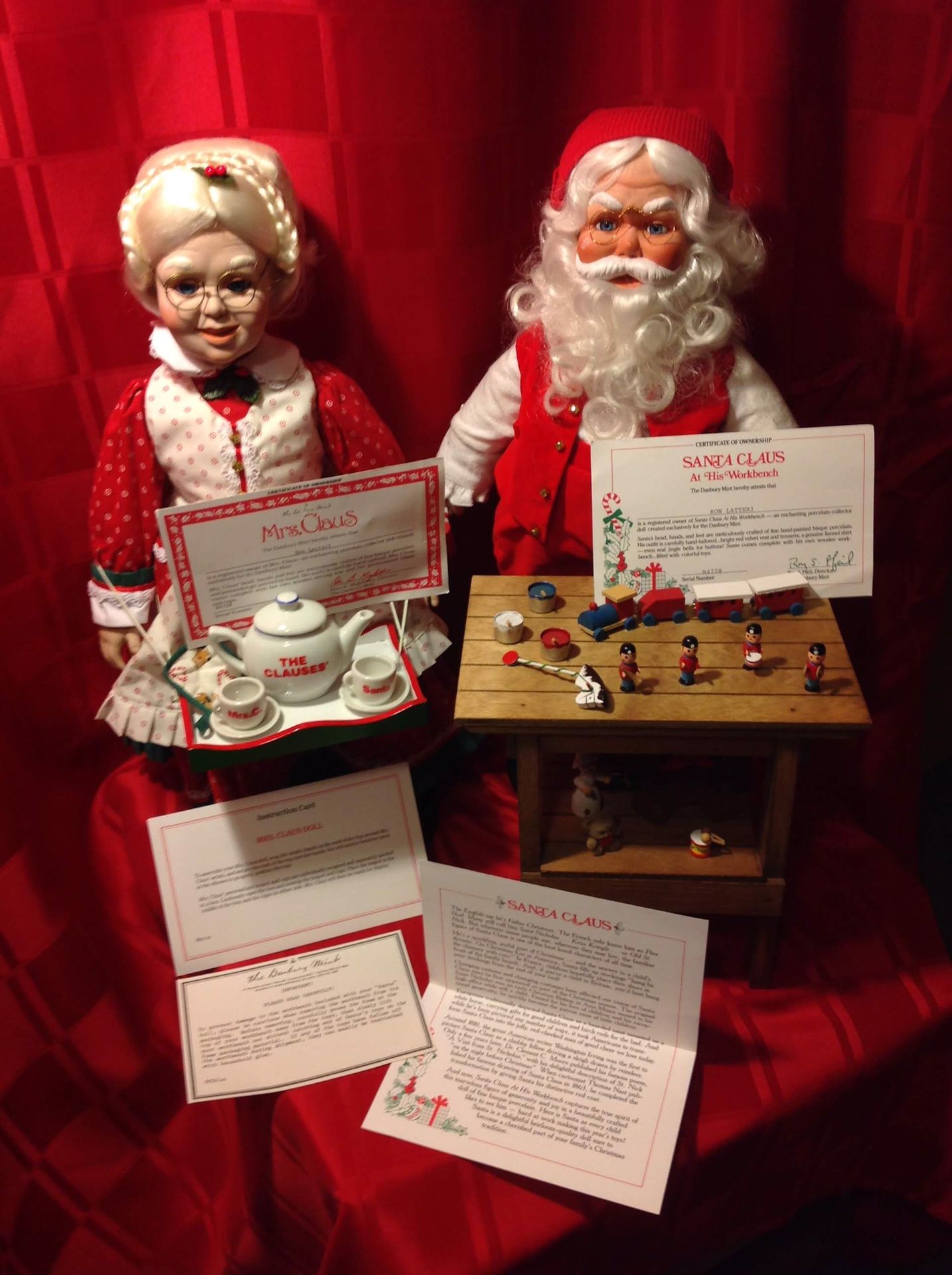 Danbury Mint Santa and Mrs. Claus Porcelain Doll Set with Workbench and Tea Tray Set