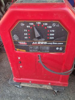Welding machine and desk