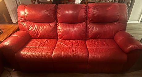 Red leather Trevino living room set from Rooms To Go $650 obo
