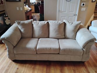 Beige Sofa With Attached Back Cushions 