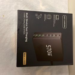    The image shows a 570W multi-device fast charger with 5 USB-C ports and 3 USB-A ports.