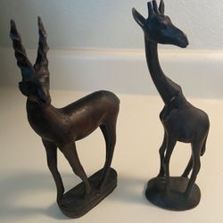 Hand carved giraffe & gazelle measure 8 and 9 inches tall