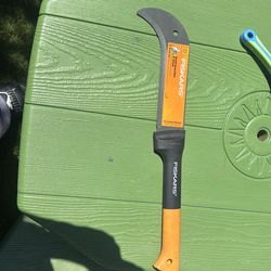 Small branches and bush axe