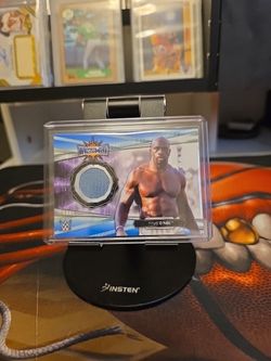 2021 Topps WWE Titus O’Neil WrestleMania Mat Relic – Serial #08/10